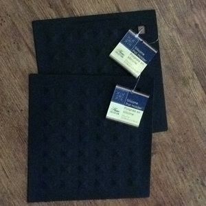 New 2 black silicone trivets pot holders 7” by 7”